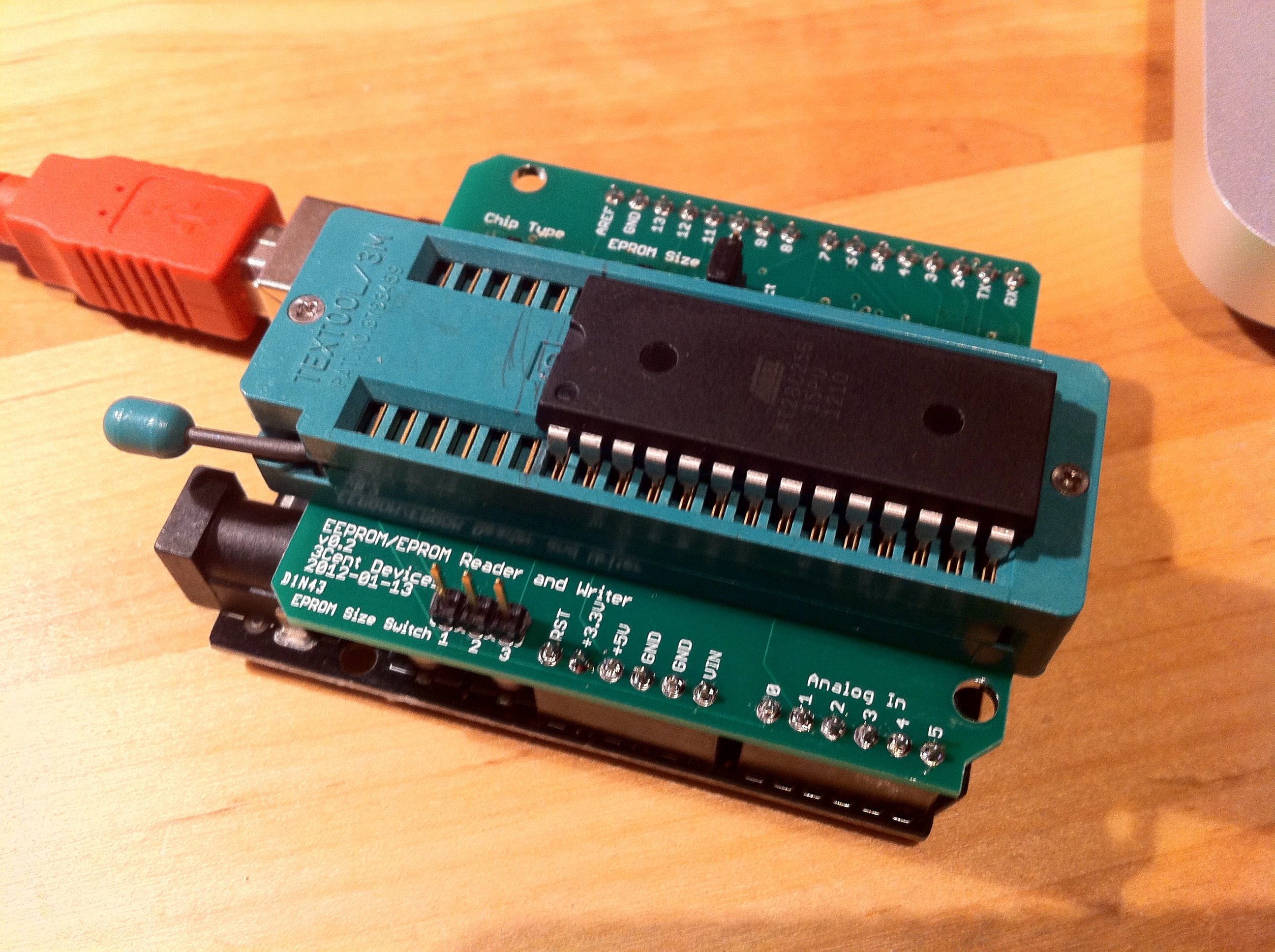 The shield itself sitting on top of an Arduino. That's an AT28C256 EEPROM...