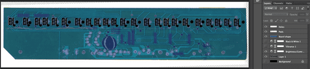 Tracing the important parts in Photoshop. The black parts will end up as a single copper layer or hole positions...